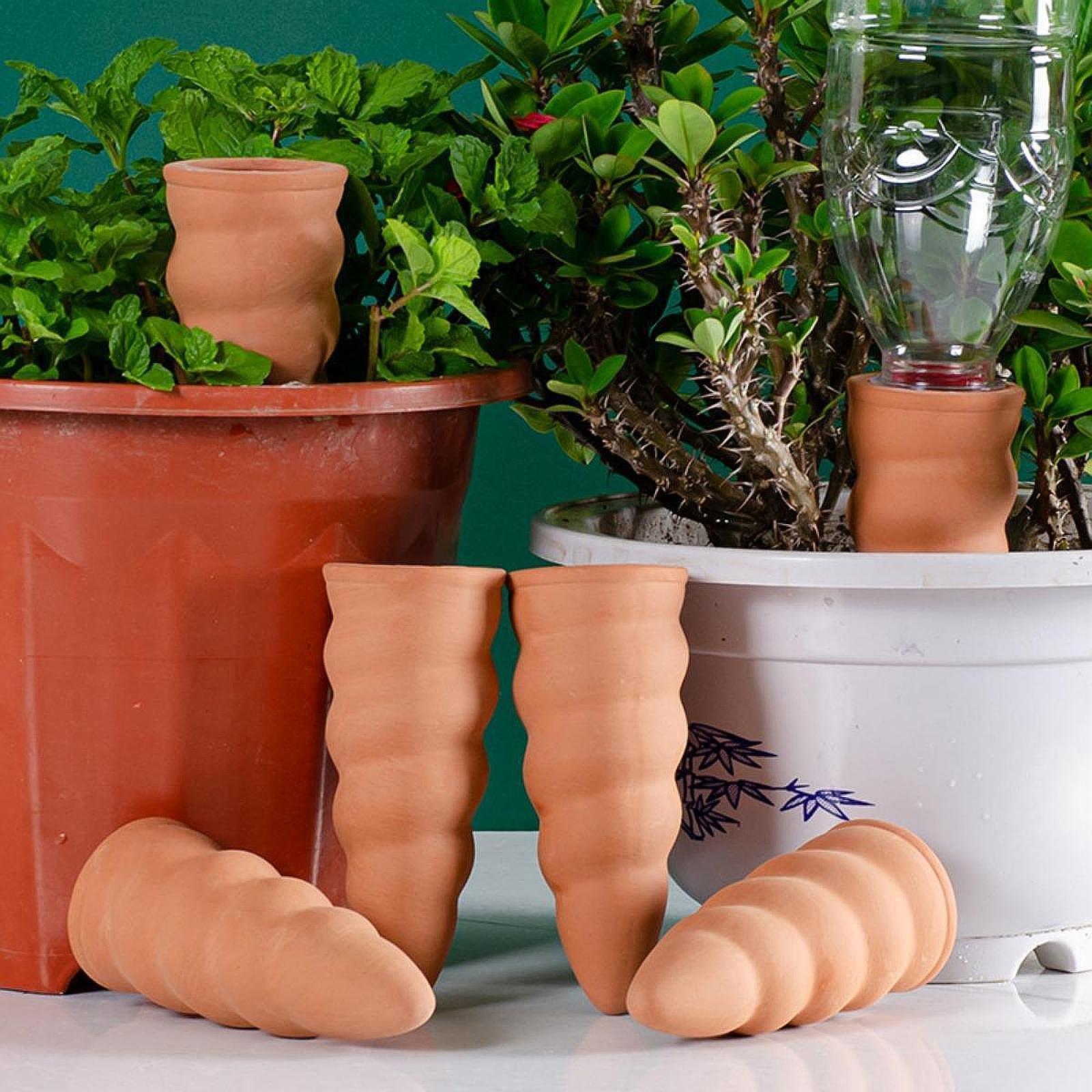 Automatische zelfwatergevende  - Automatic Plant Watering Spikes Drip Kit recensie en prijs